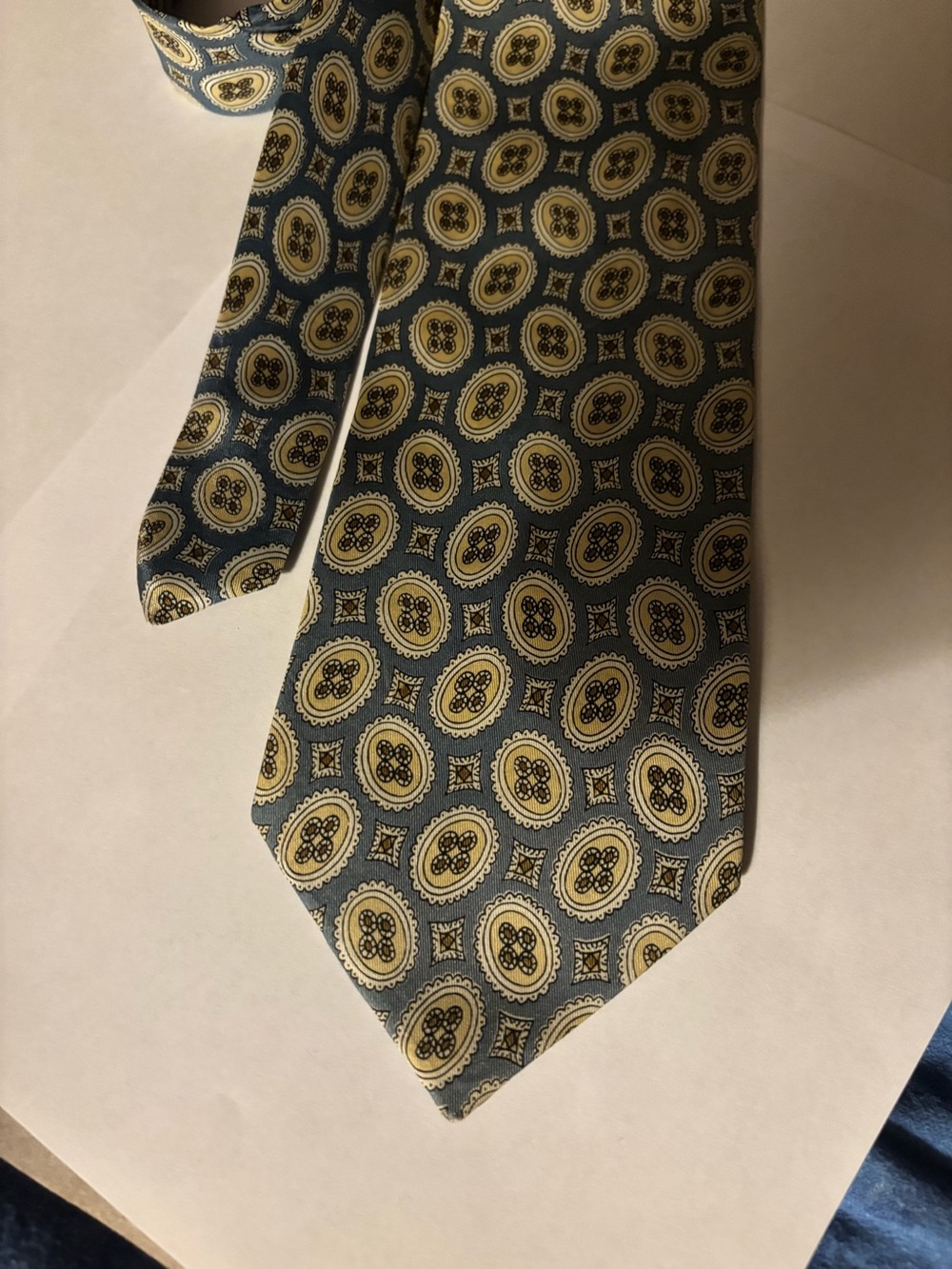 Lucca Giove’s Classic Men's Blue and Gold Medallion Silk Tie